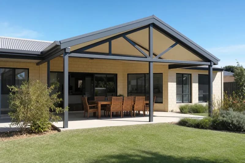 Gable roof patio with open truss framing on a cream brick Perth home